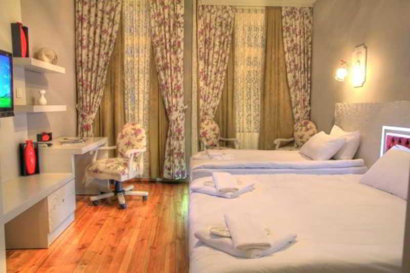 Omer Hayyam Suites Стамбул Номер фото